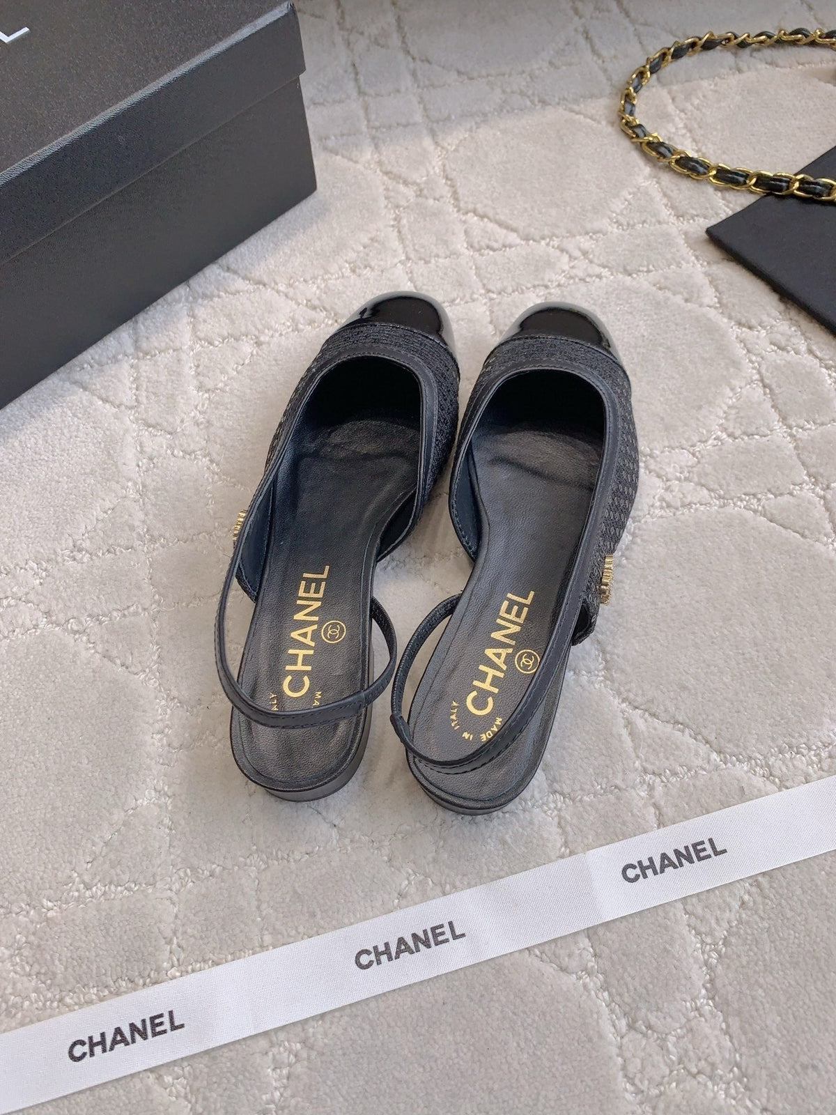 CHANEL 25S SLINGBACK IN SPARKLING BLACK CALFSKIN AND CANVAS GOLD HARDWARE